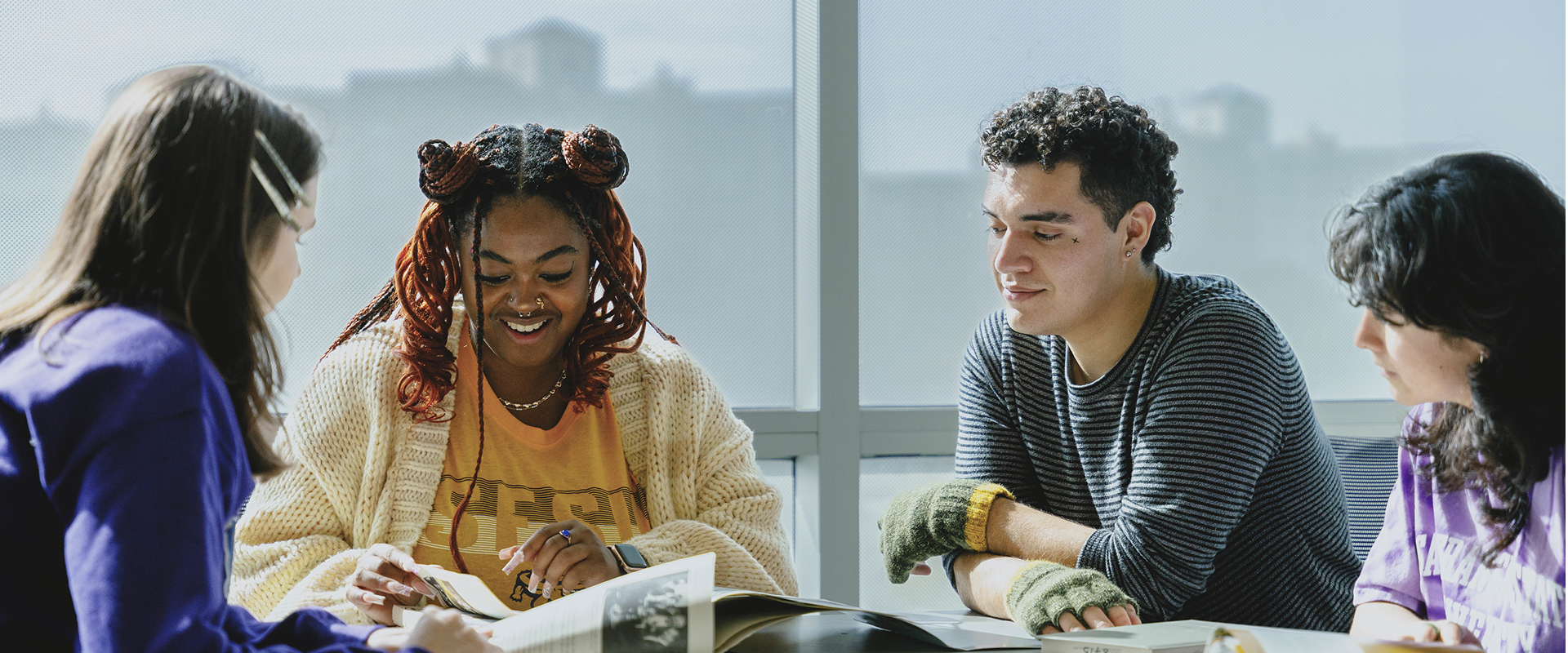 Four SFSU students working together